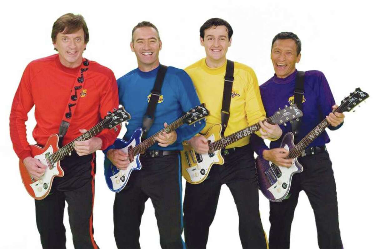 Show MoreShow. pre-school entertainers The Wiggles with their guitars. 