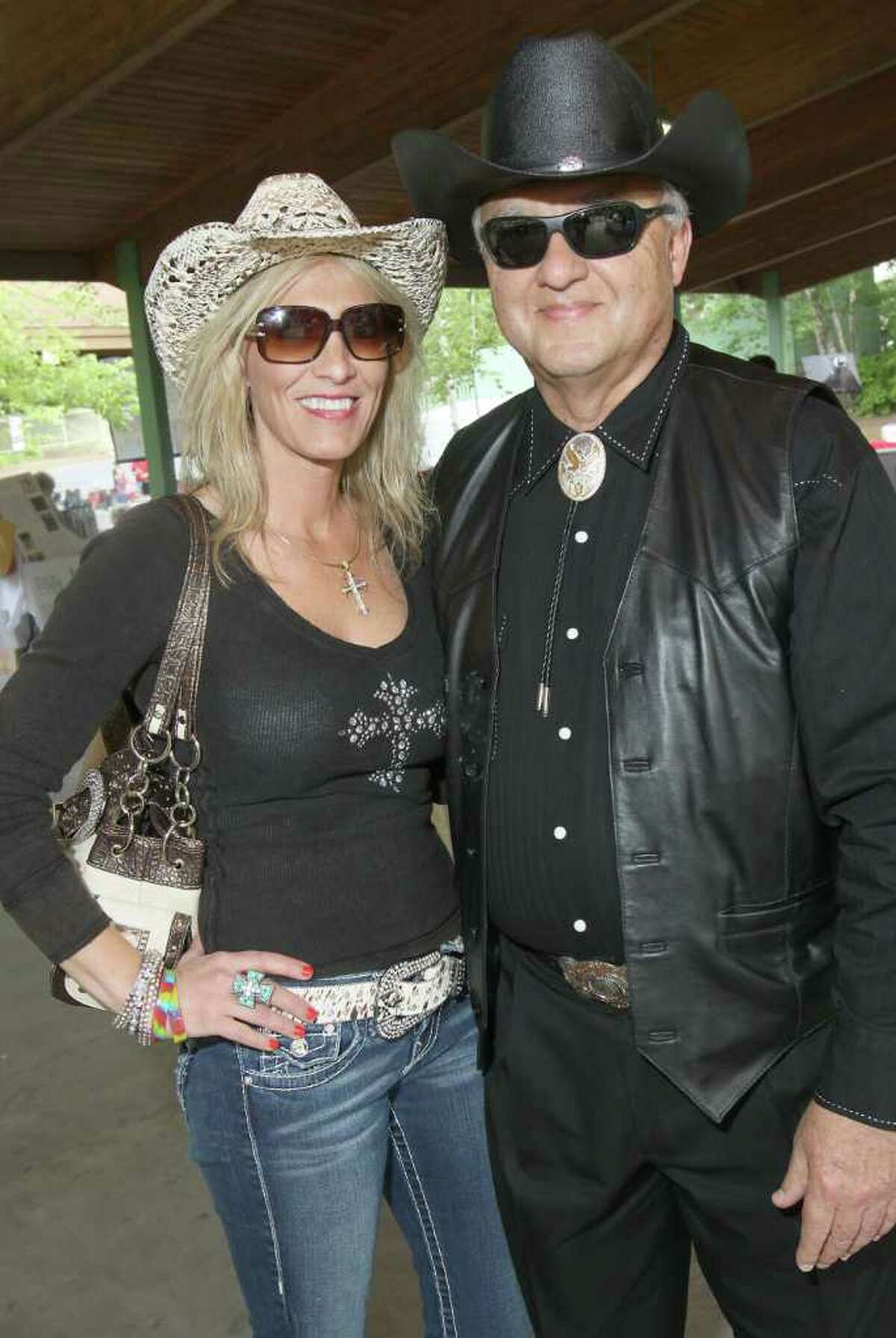 Lake George, NY - July 1, 2011 - (Photo by Joe Putrock/Special to the Times Union) - Patty Rich(left) and Vince Riggi(right) show off some of their best western wear at the Double H Ranch 20th Anniversary Gala.
