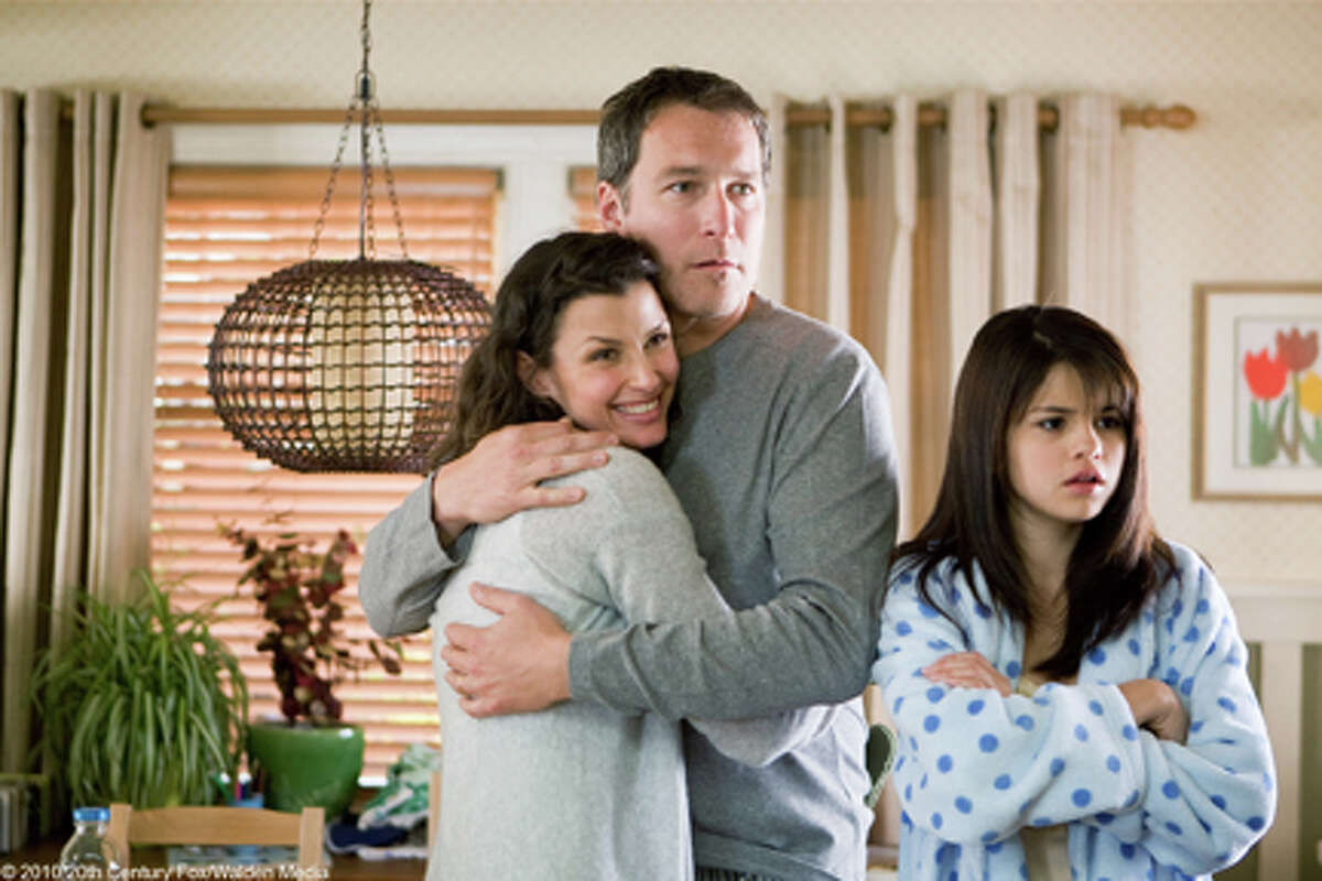 (L-R) Bridget Moynihan as Dorothy Quimby, John Corbett as Robert Quimby and Selena Gomez as Beezus in "Ramona and Beezus."