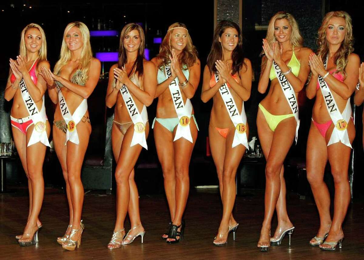 LAS VEGAS - JULY 26: (L-R) Colleen Kennedy of Nevada, Pamela Noble of California, Paige Duke of South Carolina, Aleeda Keys of California, Michelle Cooper of North Carolina, Brittany Mason of Nevada, and Nicky Taylor of Canada compete during the second annual Miss Sunset Tan Pageant at the Palms Casino Resort July 26, 2009 in Las Vegas, Nevada. Fisher was named Miss Sunset Tan 2009. (Photo by Ethan Miller/Getty Images) *** Local Caption *** Colleen Kennedy;Pamela Noble;Paige Duke;Aleeda Keys;Michelle Cooper;Brittany Mason;Nicky Taylor