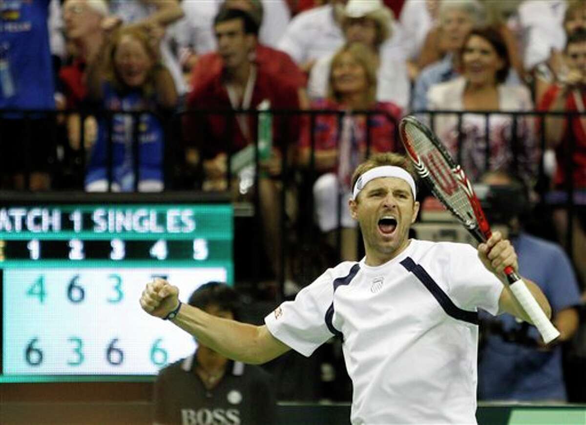 Mardy Fish of the U.S. reacts after winning a tie break in the fourth set against Feliciano Lopez of Spain during the Davis Cup quarterfinal tennis match Friday, July 8, 2011 in Austin, Texas. (AP Photo/Eric Gay)