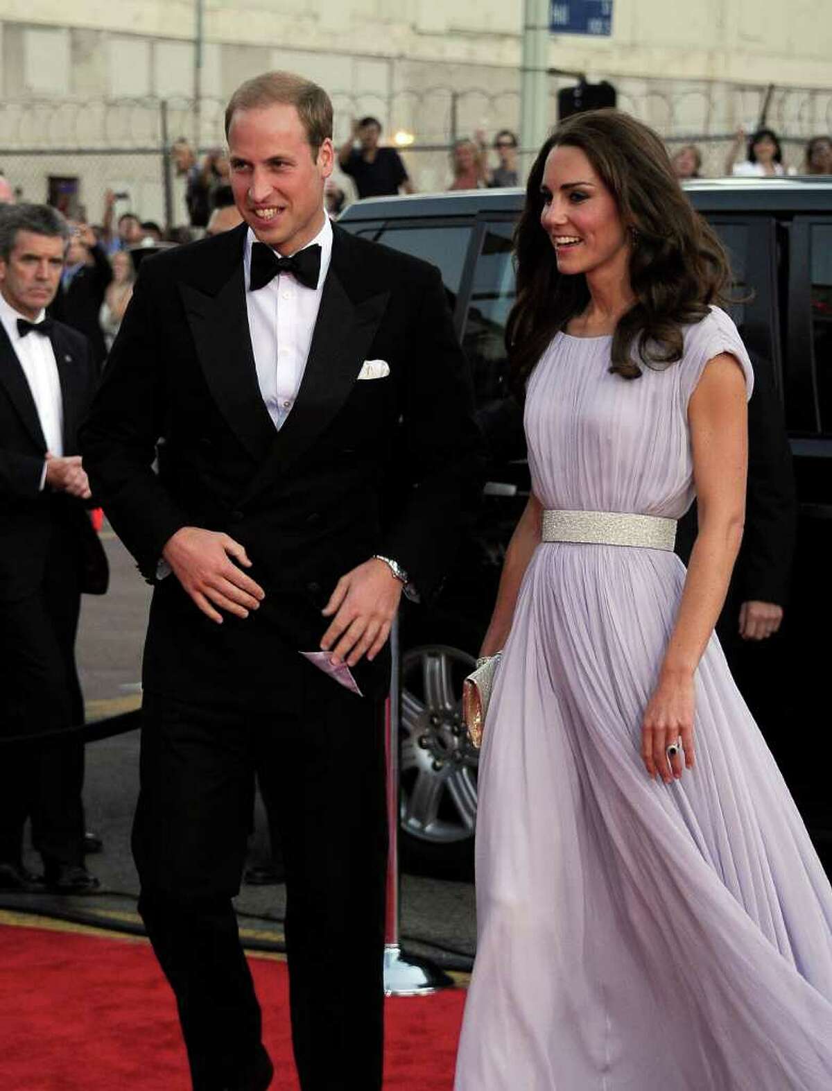 Prince William, Duke of Cambridge (L) and Catherine, Duchess of Cambridge arrive.