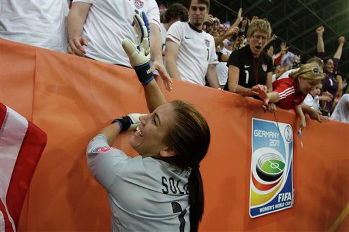 United States goalkeeper Hope Solo celebrates winning the quarterfinal match between Brazil and the United States at the Women�s Soccer World Cup in Dresden, Germany, Sunday, July 10, 2011. (AP Photo/Marcio Jose Sanchez)