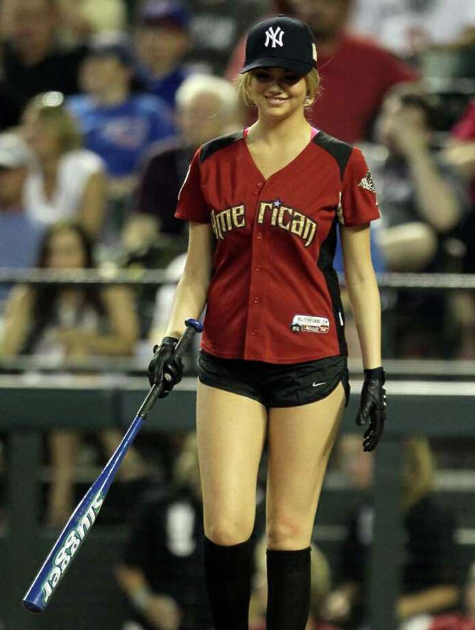 ...JULY 10: Model Kate Upton takes an at bat during the 2011 Taco Bell All-...