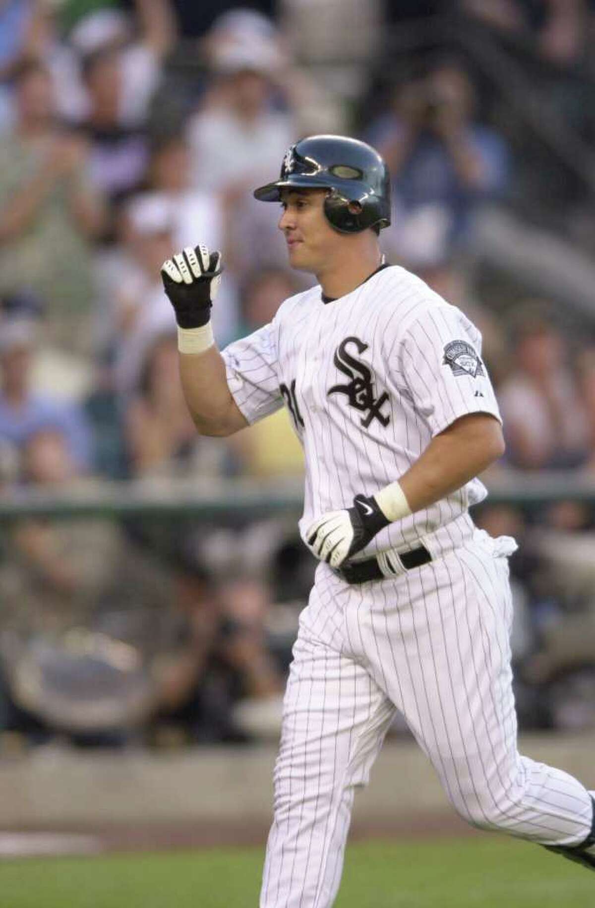10 Jul 2001: Magglio Ordonez of the Chicago White Sox celebrates his home run during the 2001 Major League Baseball All-Star Game at Safeco Field in Seattle, Washington. DIGITAL IMAGE. Mandatory Credit: Otto Greule/Allsport