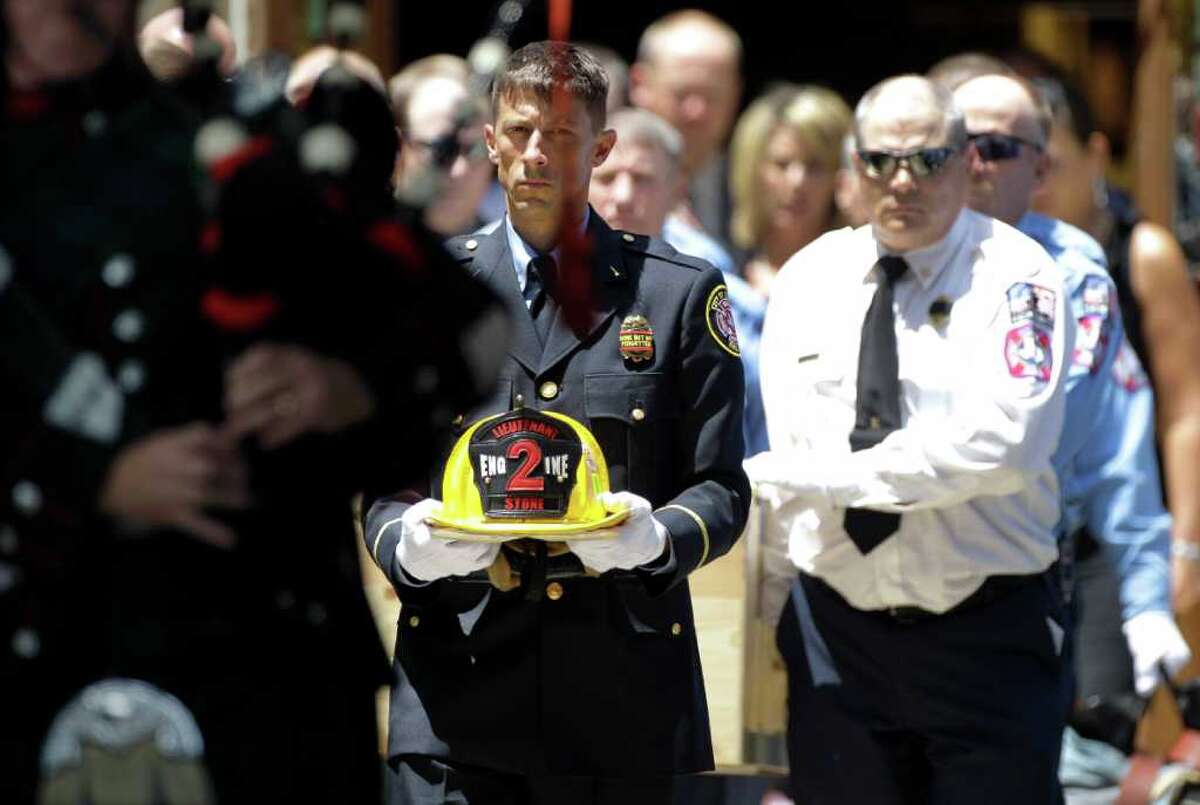 Hundreds attend funeral for Texas Rangers fan