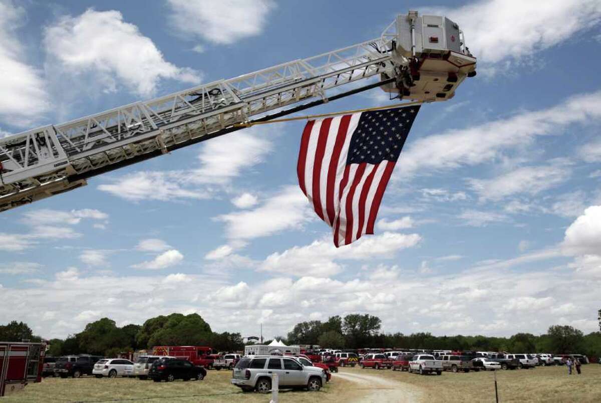 Hundreds attend funeral for Texas Rangers fan