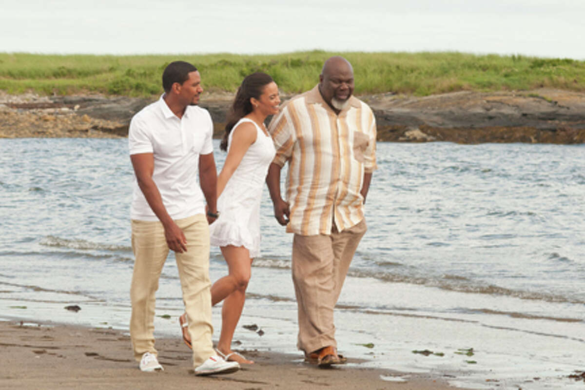 (L-R) Laz Alonso as Jason Taylor, Paula Patton as Sabrina Watson and T.D. Jakes as Reverend James in "Jumping the Broom."