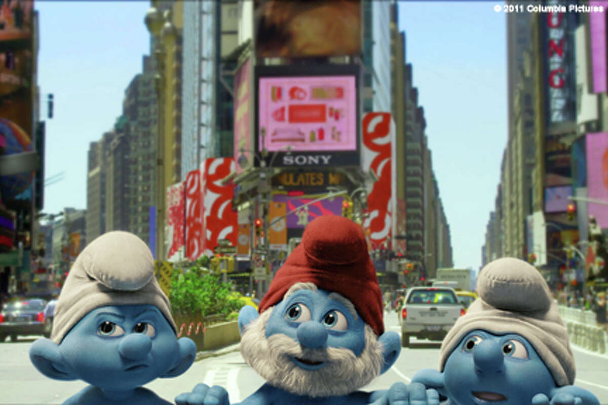 (L-R) Grouchy Smurf, Papa Smurf and Jokey Smurf in "The Smurfs."