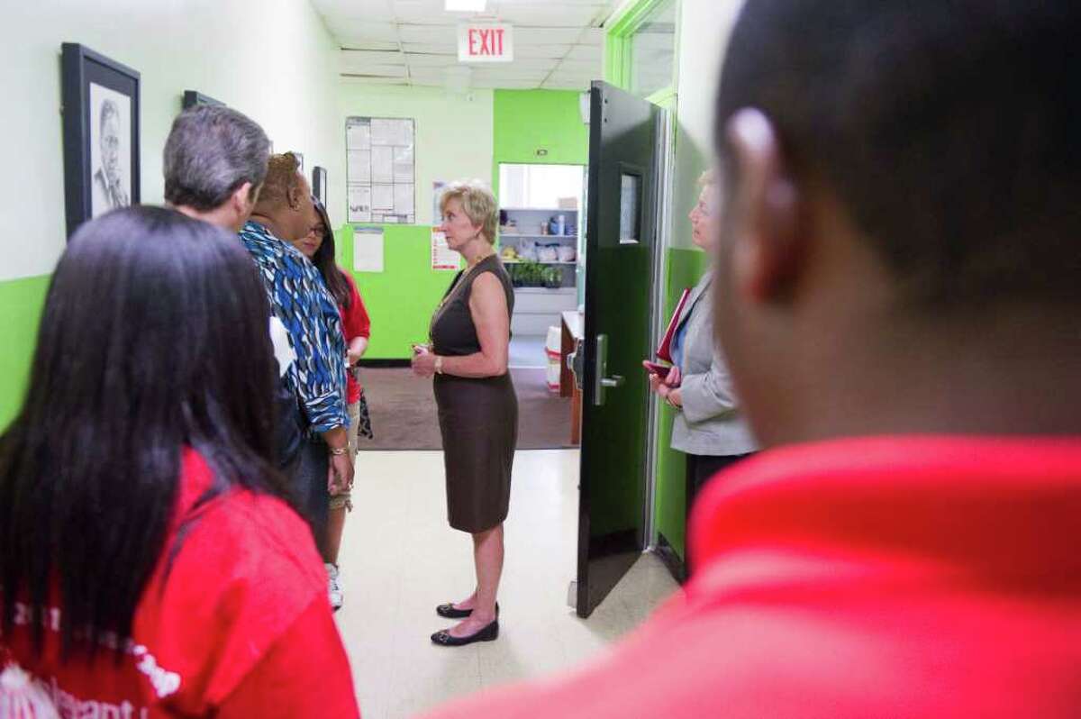 Linda McMahon tours the Yerwood Center in Stamford, Conn., July 13, 2011. The Vince and Linda McMahon Family Foundation announced a multi-year grant to the center that will provide summer jobs for 60 teens.