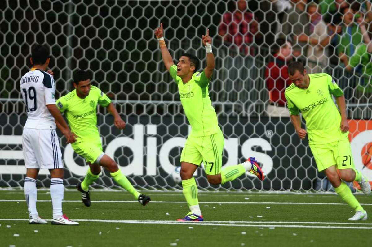 Seattle Sounders player Fredy Montero celebrates his first-half goal against the LA Galaxy during a U.S. Open Cup quarterfinal match at Starfire Sports Complex in Tukwila on Wednesday, July 13, 2011. The Sounders defeated the Galaxy 3-1.