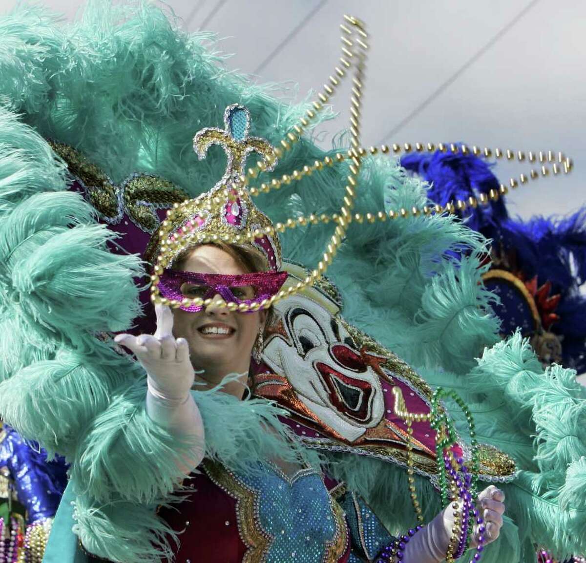 throwing mardi gras beads