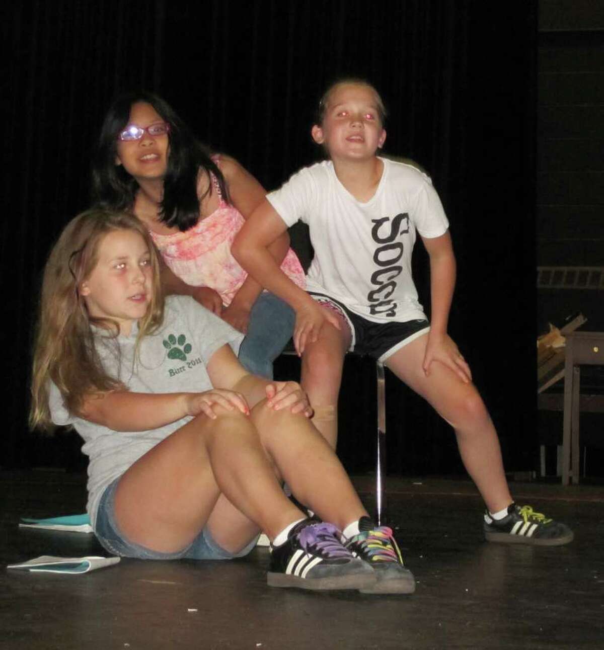 Brooke Powning, Janine Alaba and Claire Regan rehearse a scene from the Fairfield Pre-Teen Players production of "The Jungle Book." Performances are scheduled Friday, July 22, and Saturday, July 23, at Fairfield Warde High School.