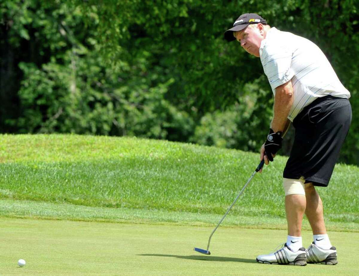 Jim Tierney plays in the 21st annual Danbury Amateur golf tournament at Richter Park Golf Course Saturday, July 16, 2011.