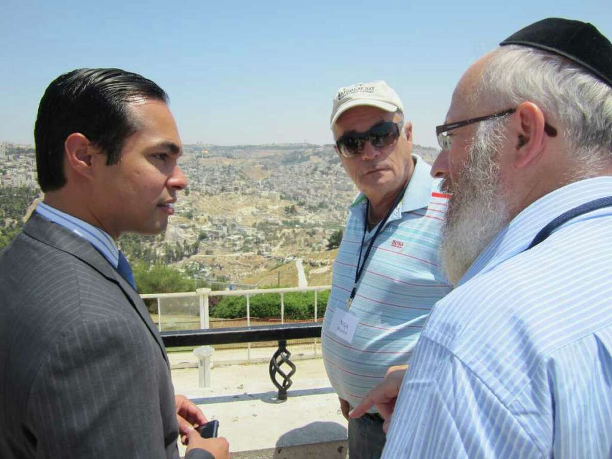 While in Israel, Mayor Julián Castro (from left) talks with Yuda Doliner of Sun Freedom America and Rabbi Chaim Block of Chabad Lubavitch of South Texas.
