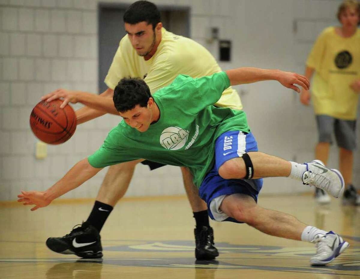 Weston's Matt Smolinsky attempts to make a steal during a summer league matchup with Joel Barlow at Christian Heritage School in Trumbull on Sunday, July 10, 2011.