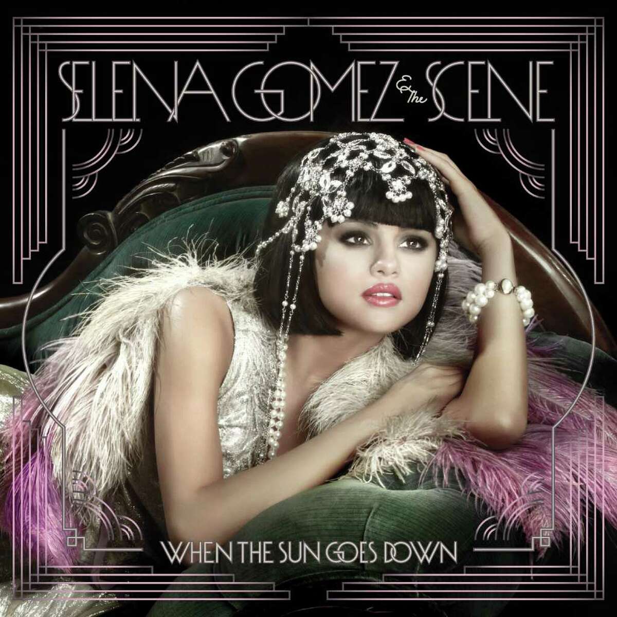 In this CD cover image released by Hollywood Records, the latest release by Selena Gomez & the Scene, "When the Sun Goes Down," is shown.