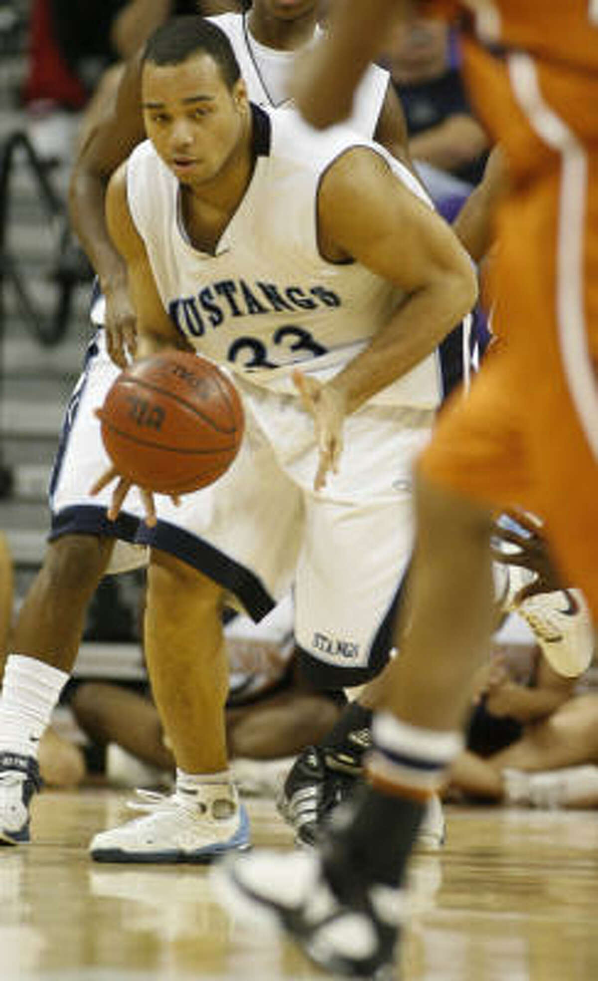 Kingwood's Dondre Wise steals a pass from San Antonio Madison Roshun Jackson during the Mustangs' state semifinal win.