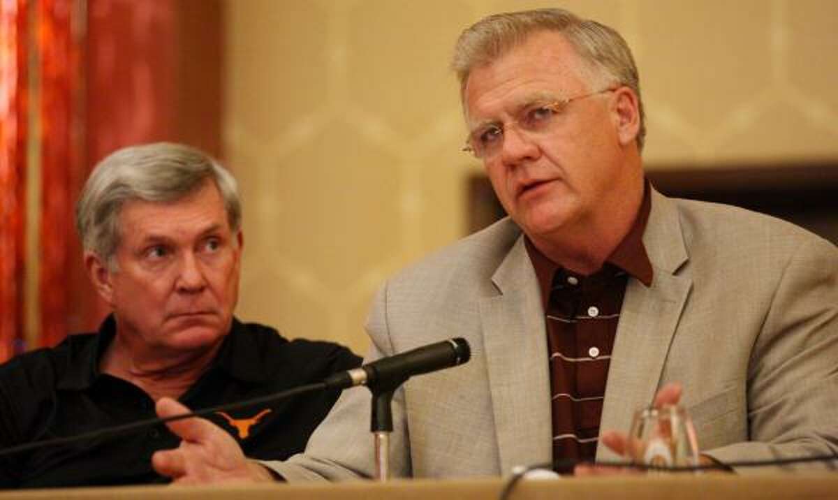 Texas' Mack Brown and Texas A&M's Mike Sherman discussed things other than the fate of the Big 12.