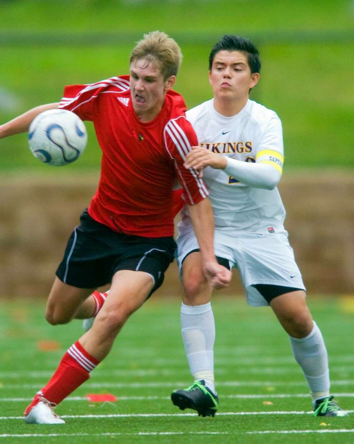 Gregory Kane, left, of Greenwich High School, and Henry Bareiss, right, of Westhill High School, during an FCIAC soccer match at Westhill High School in Stamford on Tuesday, Sept. 29, 2009.