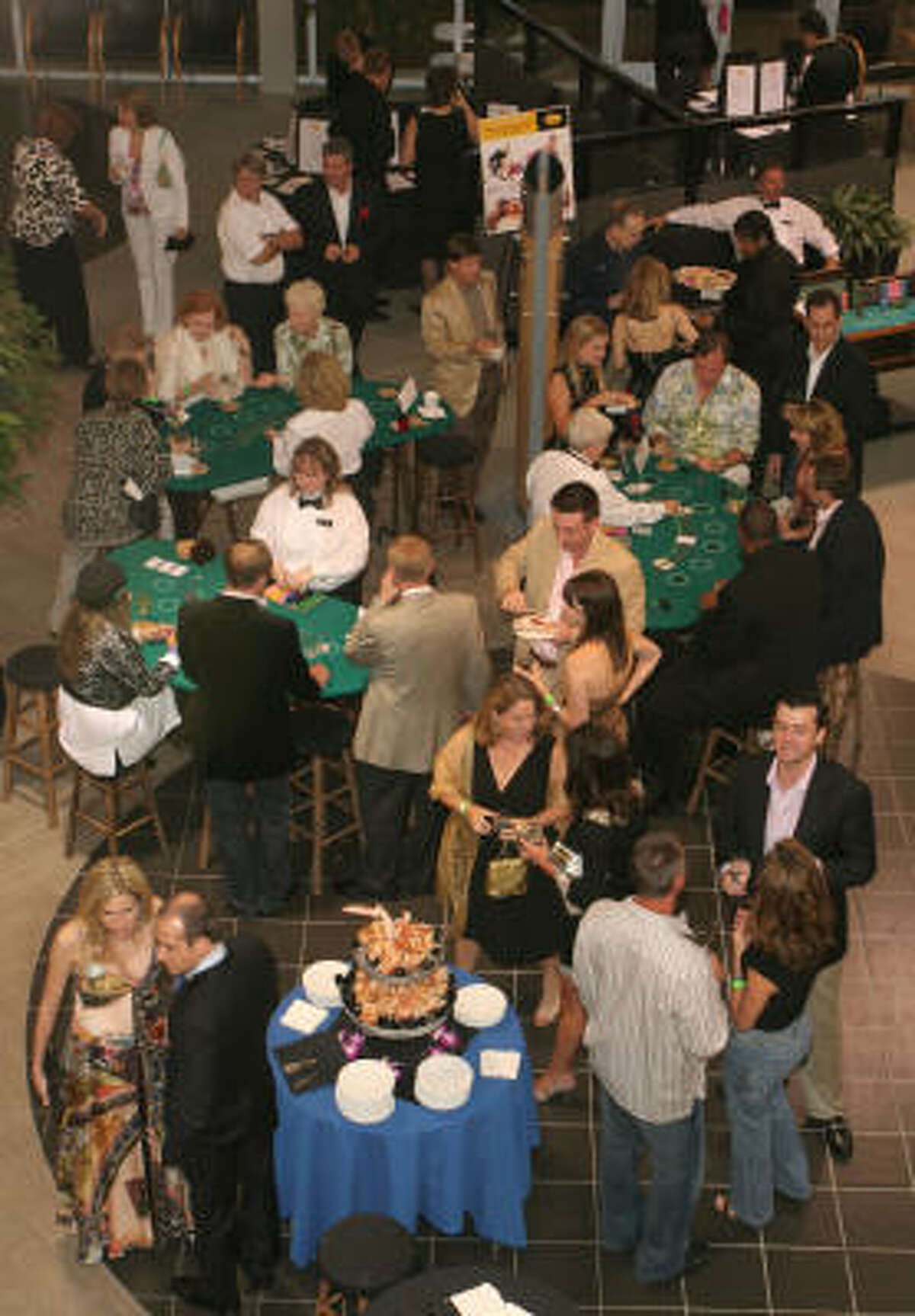 With the jazzy cars removed, the showroom at Momentum Audi made the perfect setting for gaming tables and food stations for the Health Museum Casino Night benefit.