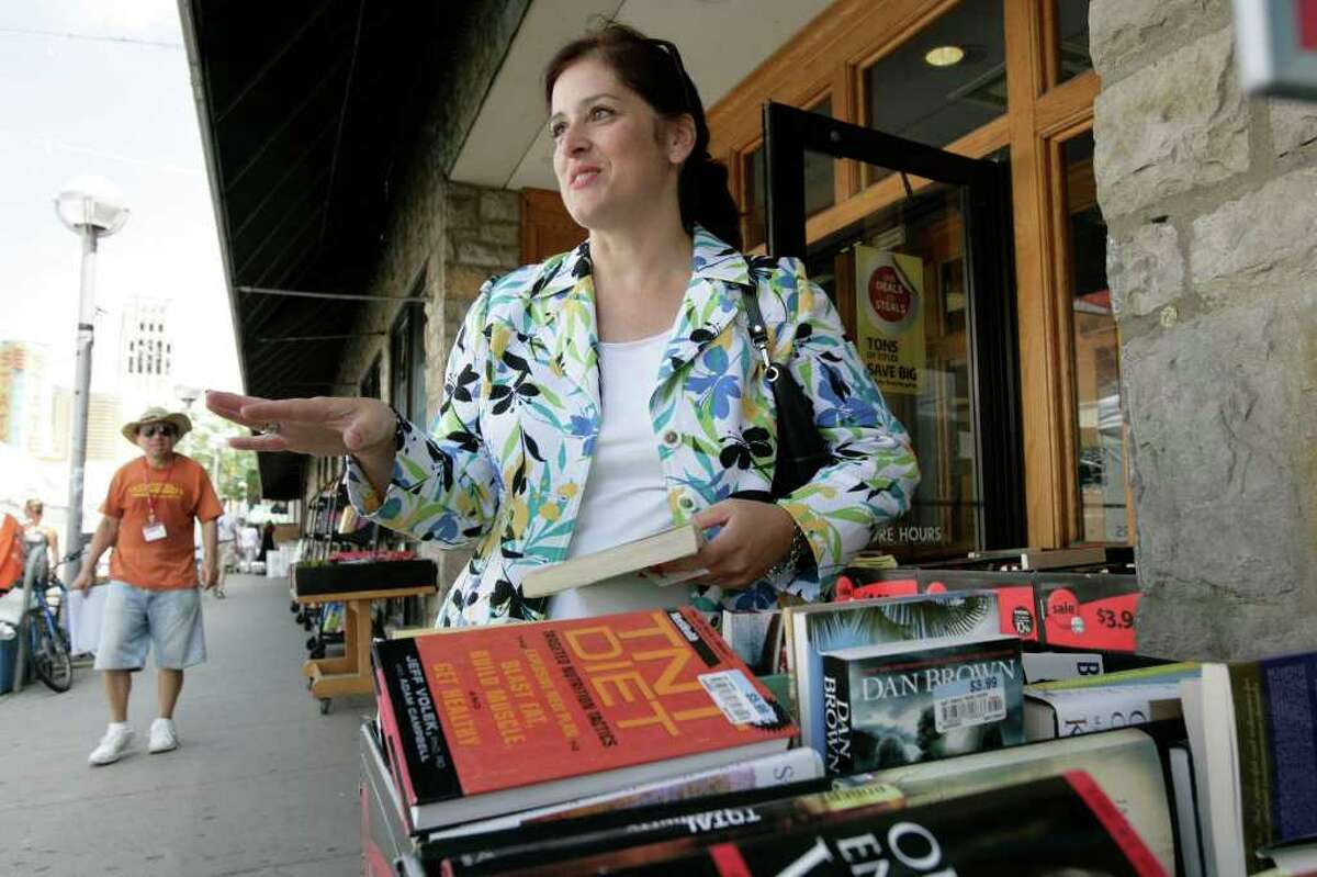 Mary Hays, 45, of Saline, Mich. speaks to a Free Press reporter outside the Borders store in Ann Arbor, Mich. on Tuesday, July 19, 2011.
