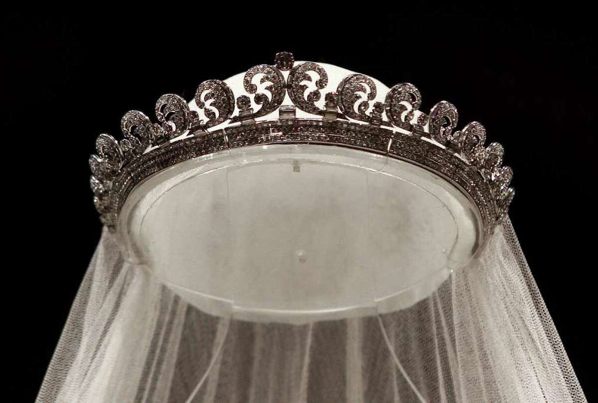 The Cartier "Halo" tiara, worn by the Duchess of Cambridge on her wedding day is seen in Buckingham Palace in London, Wednesday July 20, 2011, before it goes on display during the palace's annual summer opening. The tiara, which was the Duchess' "something borrowed" , was was loaned to the bride by Queen Elizabeth II, a tradition for royal weddings.