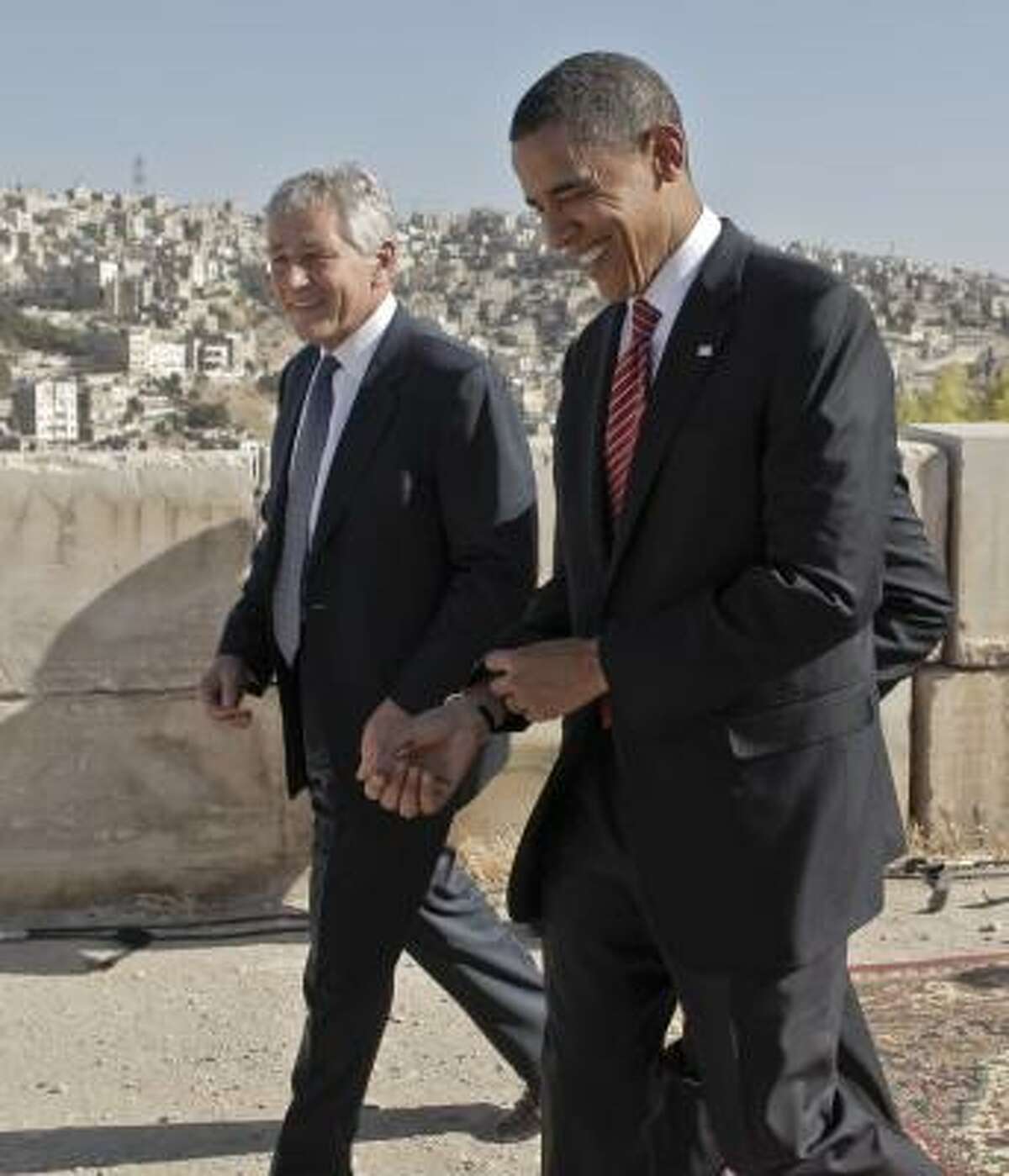 Democratic presidential candidate Sen. Barack Obama, D-Ill., right, walking with Sen. Chuck Hagel, R-Neb., as they tour the citadel in Amman, Jordan, on July 22. Talk of Hagel as a potential running mate for Obama tends to confound partisans in both parties.
