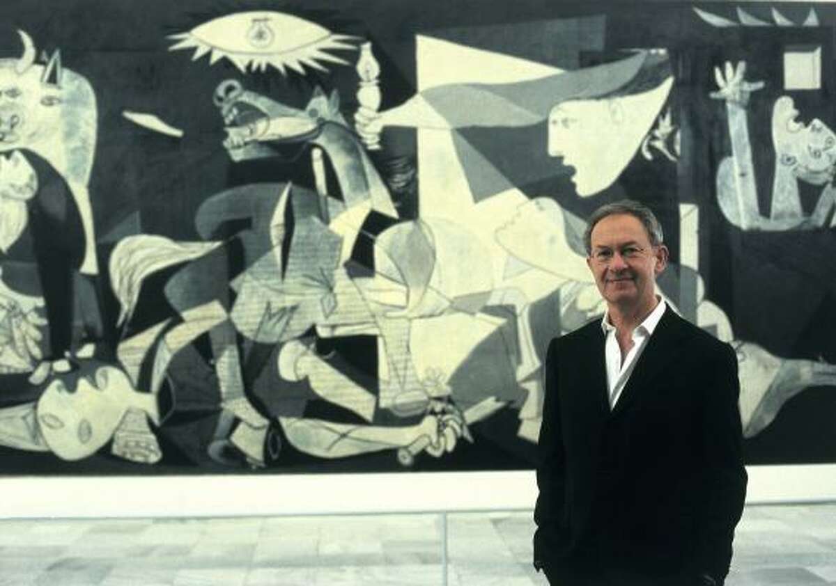 Historian and writer Simon Schama stands in front of Picasso's Guernica in The Power of Art.