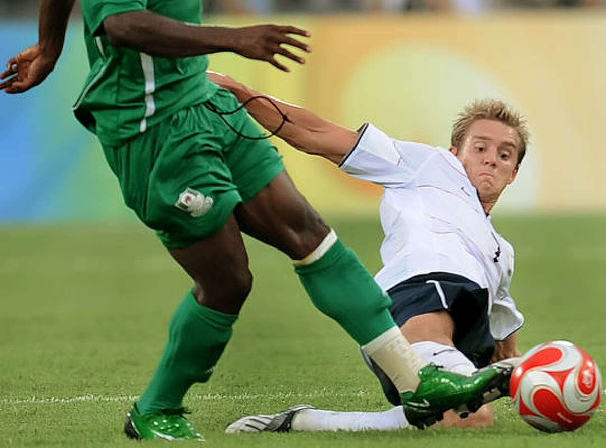 Stuart Holden, right, and the U.S. saw their Olympic dream end prematurely Wednesday in a 2-1 loss to Nigeria.