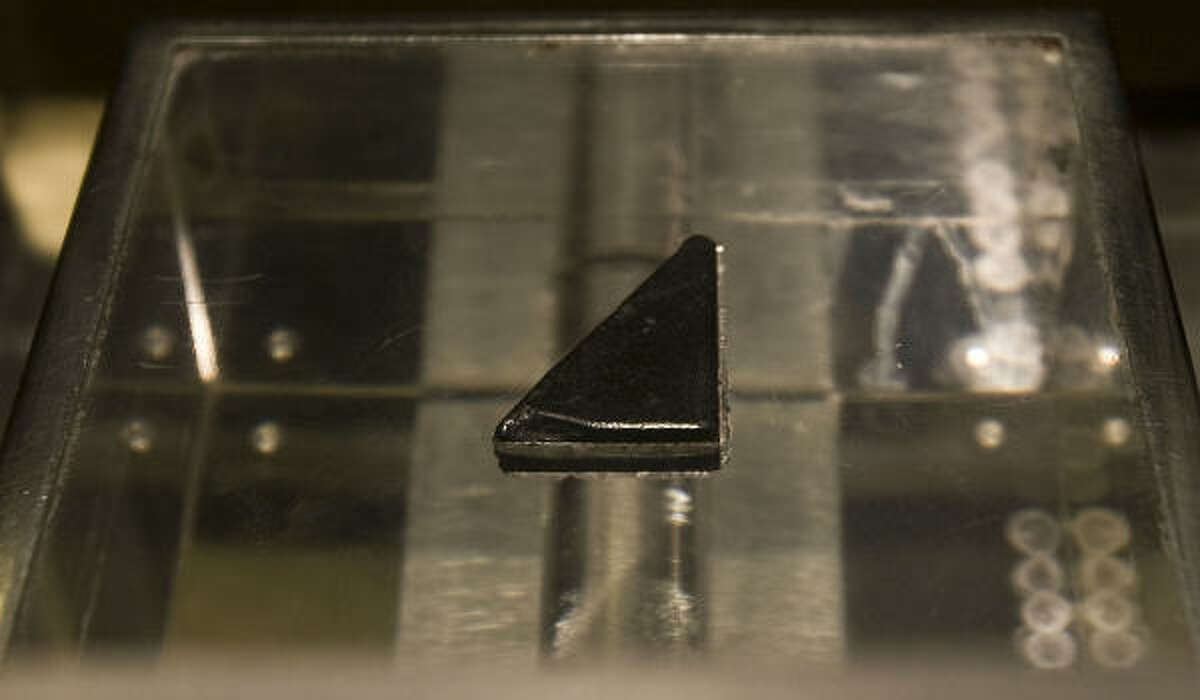 A moon rock is shown at Space Center Houston on Thursday.