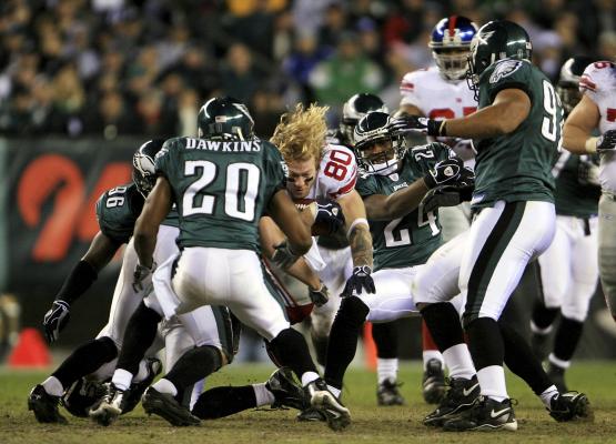 Jeremy Shockey of the New York Giants gets hit by Brian Dawkins and News  Photo - Getty Images