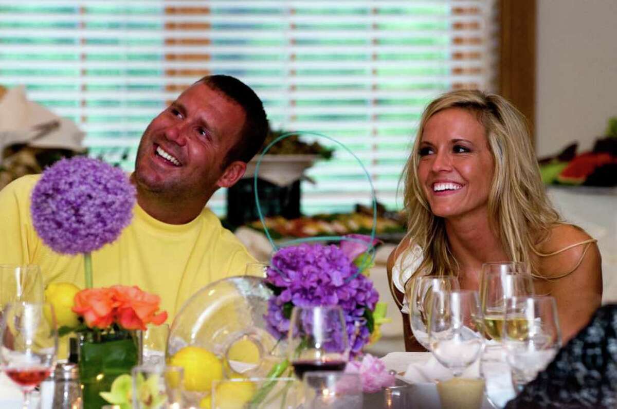 In this photo taken July 22, 2011 and released by the couple's photographer, Pittsburgh Steelers quarterback Ben Roethlisberger, left, and Ashley Harlan of New Castle, Pa., attend their rehearsal dinner Friday, July 22, 2011 in Ohio Township, Pa.. The couple will be married Saturday, July 23, 2011 at Christ Church at Grove Farm in Ohio Township, Pa..(AP Photo/Mike Goldstein-Goldstein Photography.com)