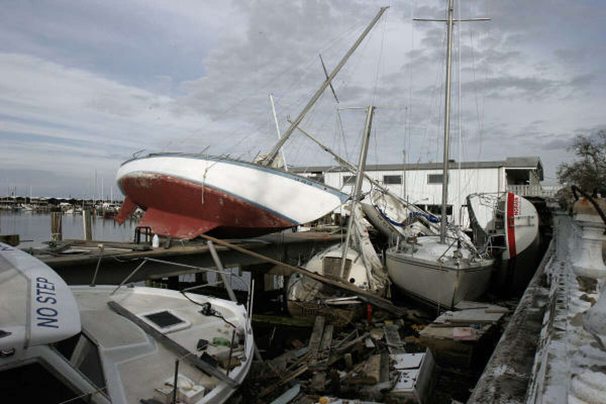 Problems, like these boats at the Municipal Yacht Harbor, just keep mounting in New Orleans, which is plagued by a higher crime rate and fears about the safety of its levees. Some residents have lost hope.