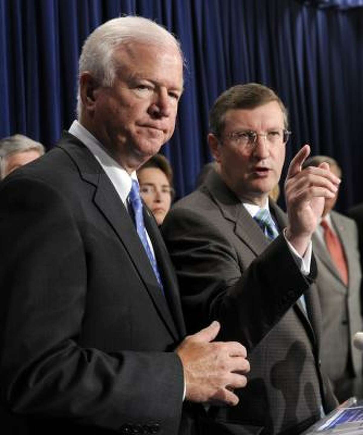 Sen. Saxby Chambliss, R-Ga., left, and Sen. Kent Conrad, D-N.D., right, both members of the bipartisan coalition of Senators know as the "Gang of Ten," discuss their energy plan, Friday.