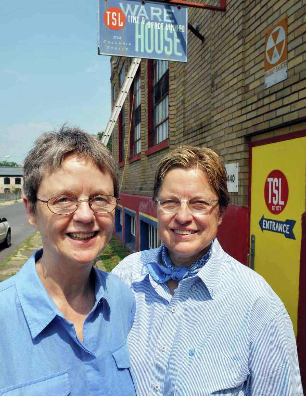 Claudia Bruce and Linda Mussmann, who have been together more than 35 years and want to be the first same-sex couple married under the new law, outside Time and Space Limited in Hudson Wednesday July 20, 2011. (John Carl D'Annibale / Times Union)