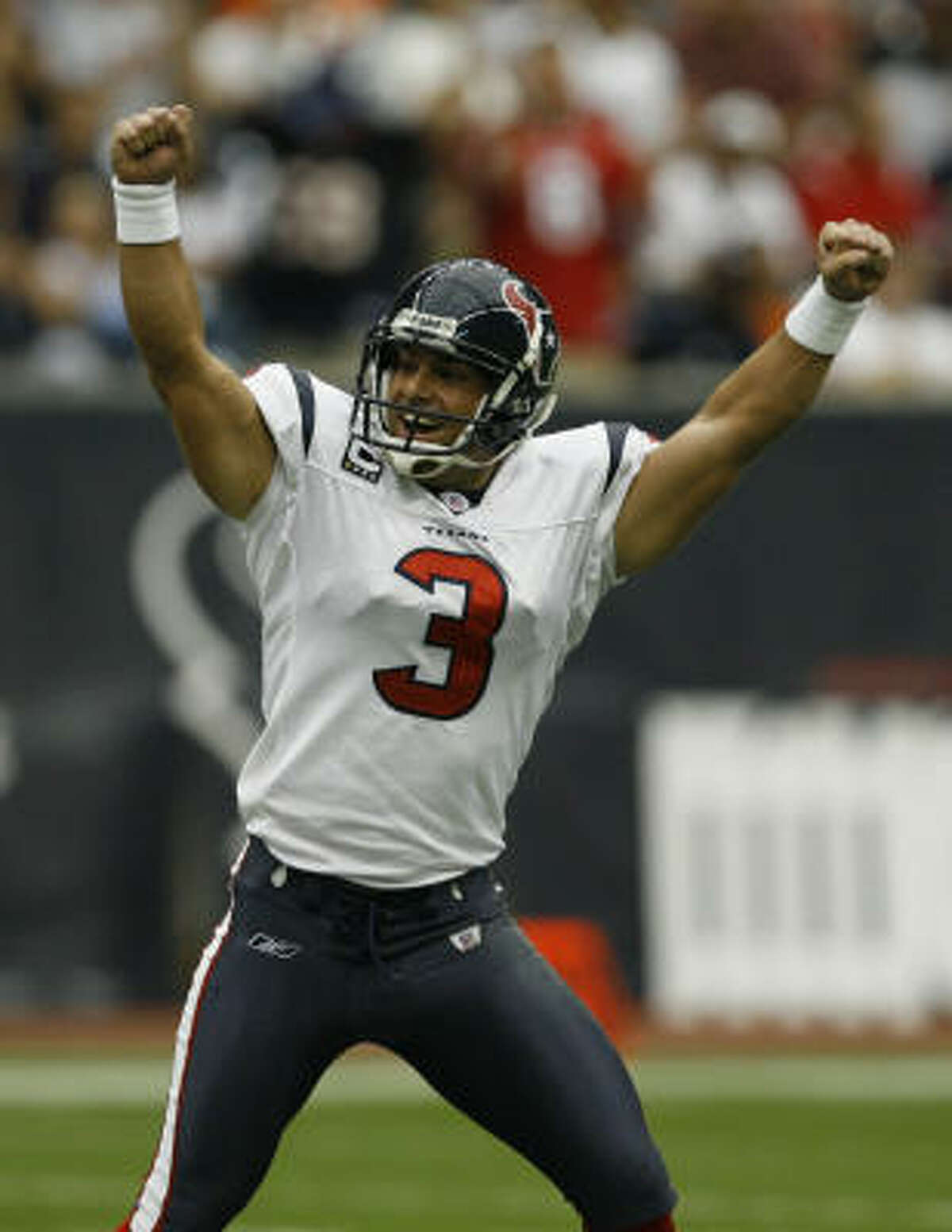 Texans kicker Kris Brown celebrates after making a 54 yard field goal, the longest in franchise history, which he would tie a quarter later.