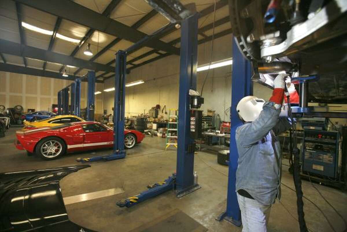 Alan Webb, head fabricator at Hennessey Performance Engineering in northwest Houston, welds exhaust tips on a Viper Competition Coupe. John Hennessey, owner of the shop, has built his hobby into a $4 million-a-year business.