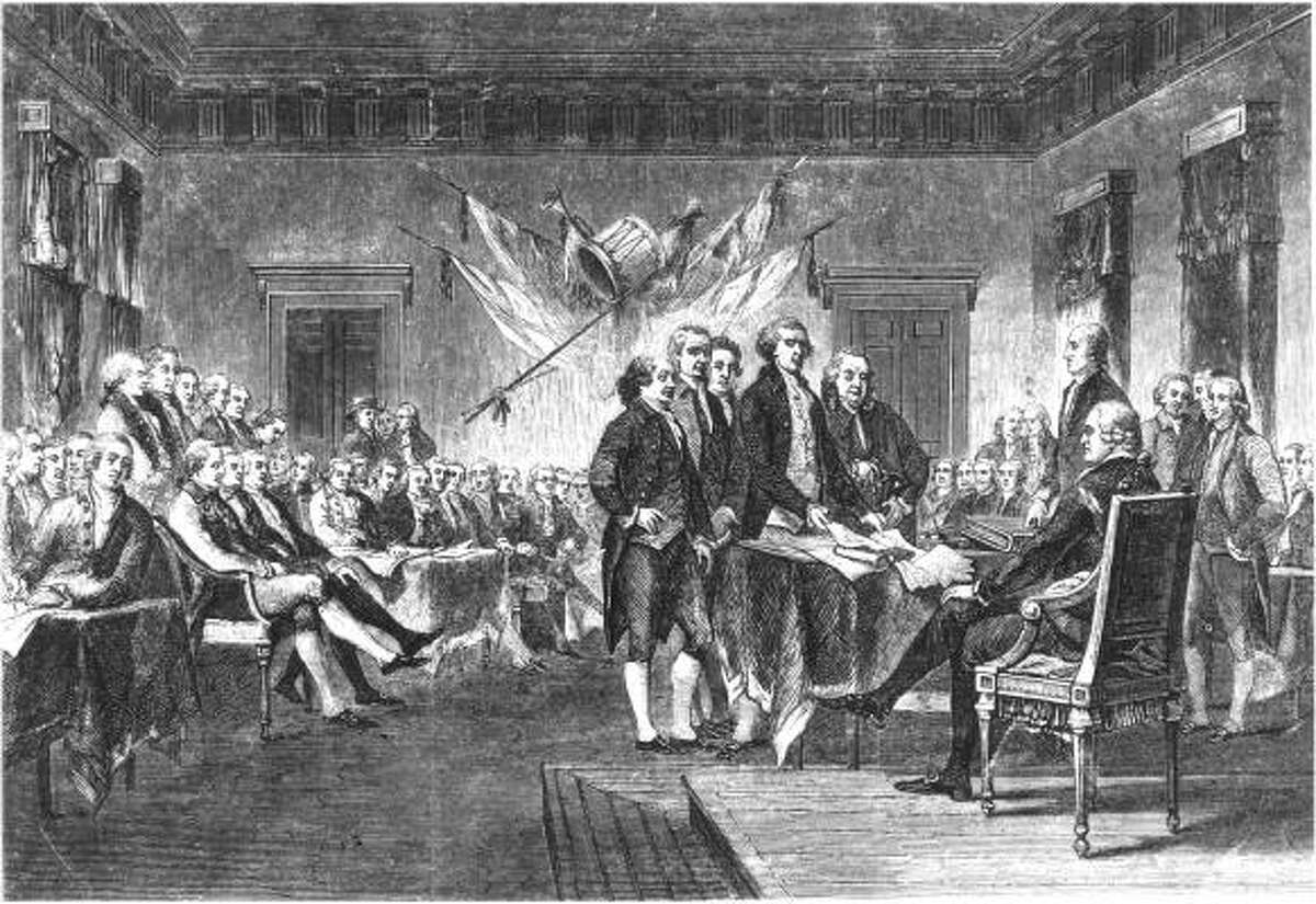Thomas Jefferson leads the signing of the Declaration of Independence in Philadelphia in 1776.