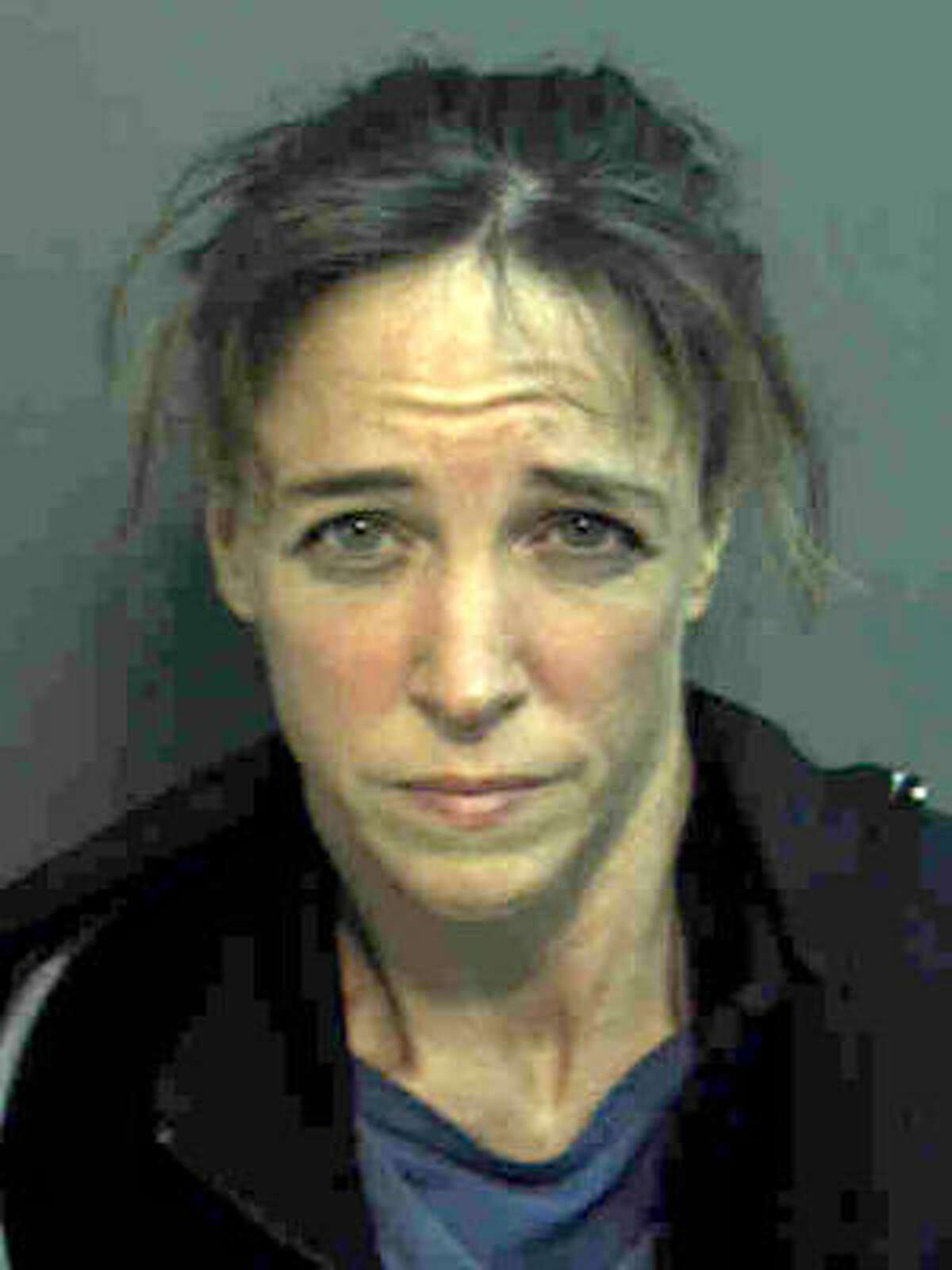This police booking photo shows astronaut Lisa Nowak following her arrest for attempting to kidnap a woman she believed was romantically involved with another astronaut.