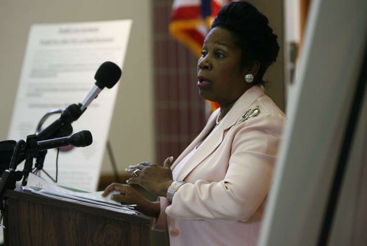 Sheila Jackson Lee speaks to the people assembled at her town hall meeting Tuesday.