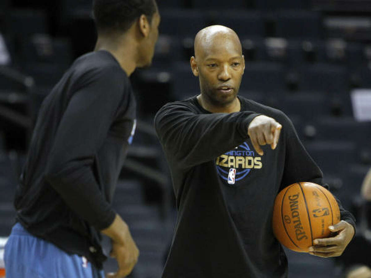 Former Rockets guard Sam Cassell, right, is currently an assistant coach with the Washington Wizards.