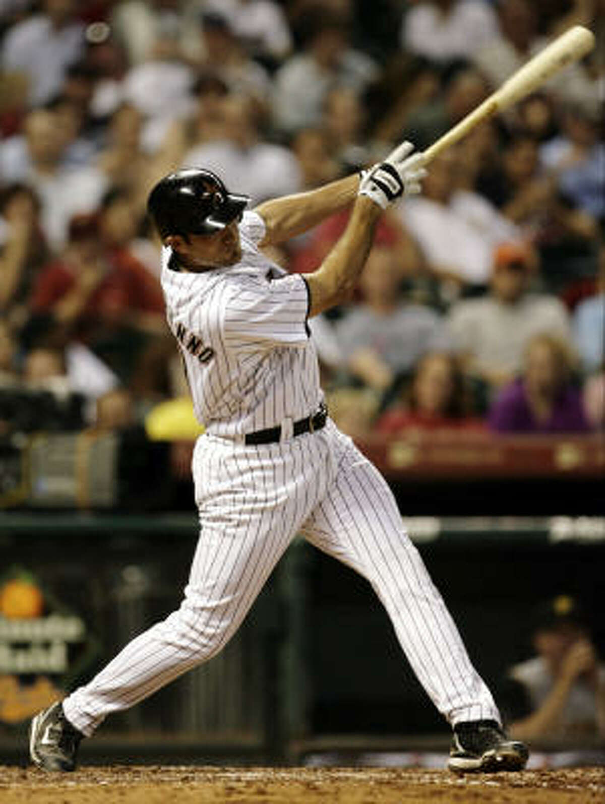 Mark Saccomanno hits a home run in the fifth inning against the Pittsburgh Pirates on Monday at Minute Maid Park.