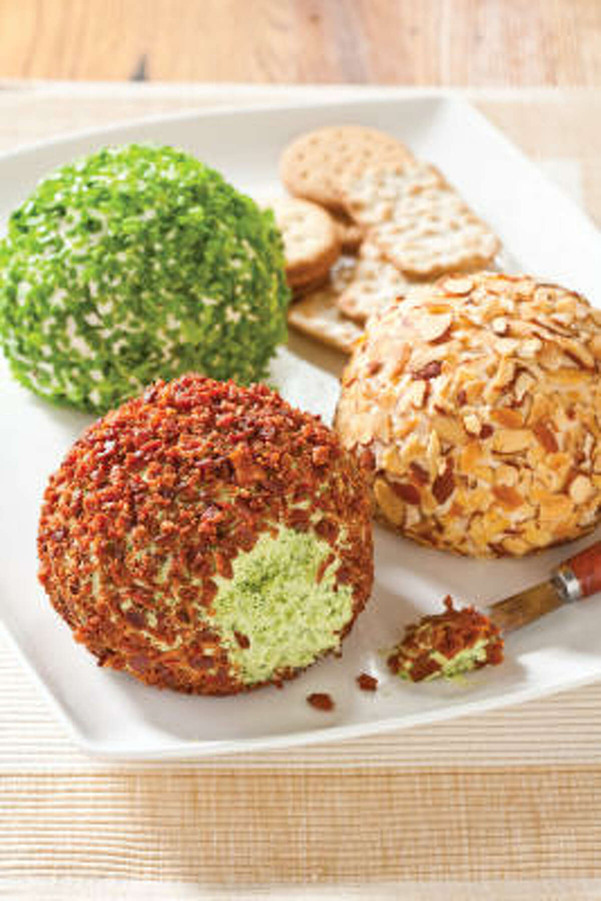 With a few simple substitutions, a Classic Cheddar Cheese Ball recipe can yield infinite variations.