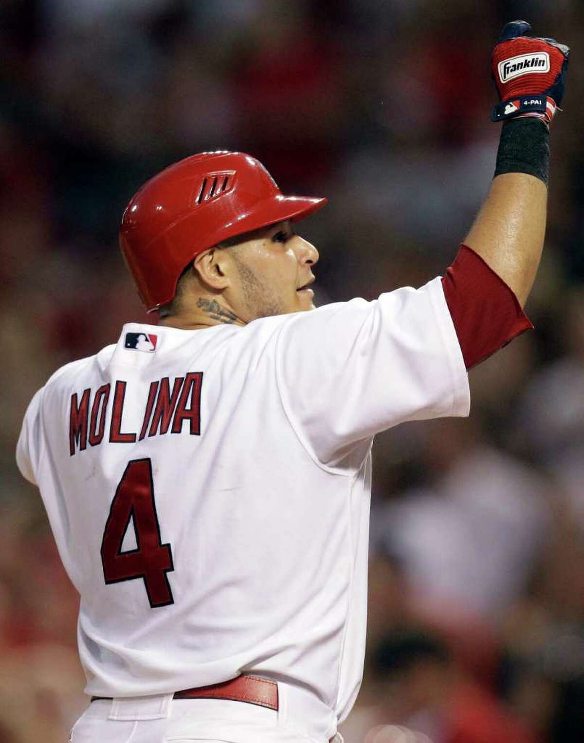 Molina's bat stays hot, paces St. Louis
