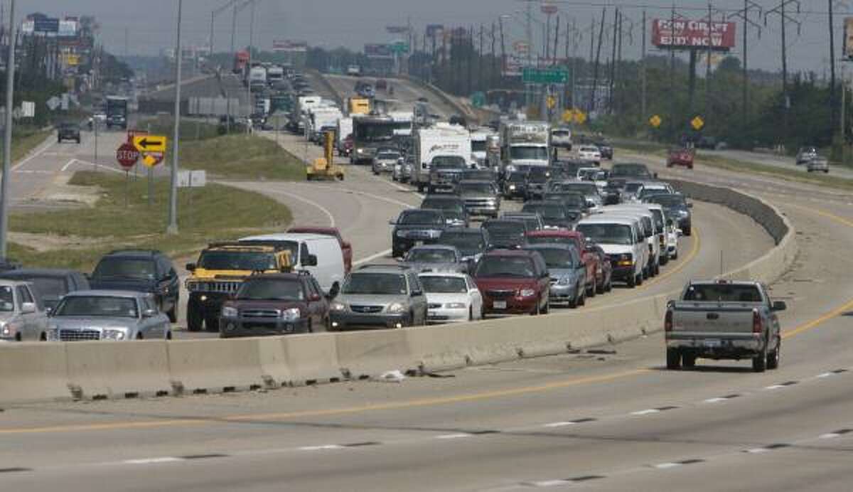 Westbound traffic on I-10 comes to a stop Saturday near Baytown. Heavy traffic also was reported on the Eastex Freeway late Saturday as Louisiana and Southeast Texas residents headed west through Houston.