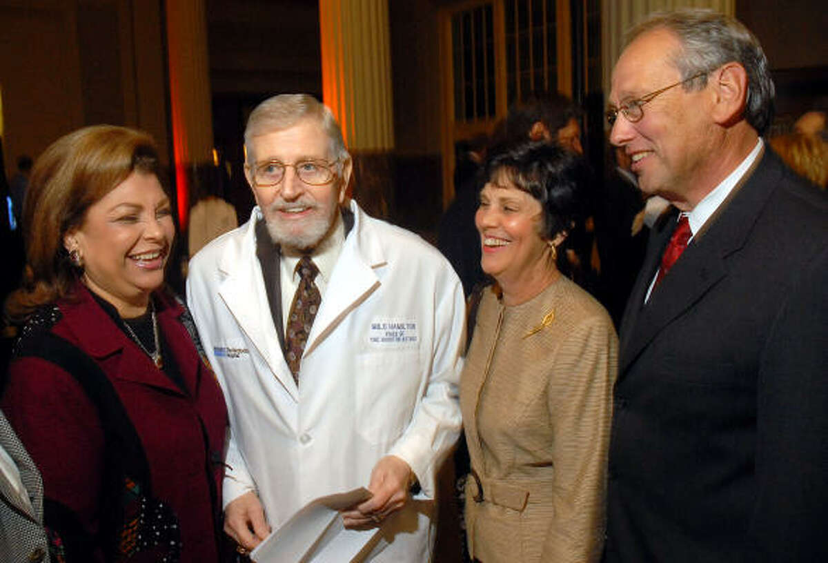 Joining in the Mini Med School fun at Union Station Thursday night were Irene Fraga, from left, ``Dr.'' Milo Hamilton and Judy and Ron Girotto, president and CEO of the Methodist Hospital System, who celebrated his birthday at the benefit.