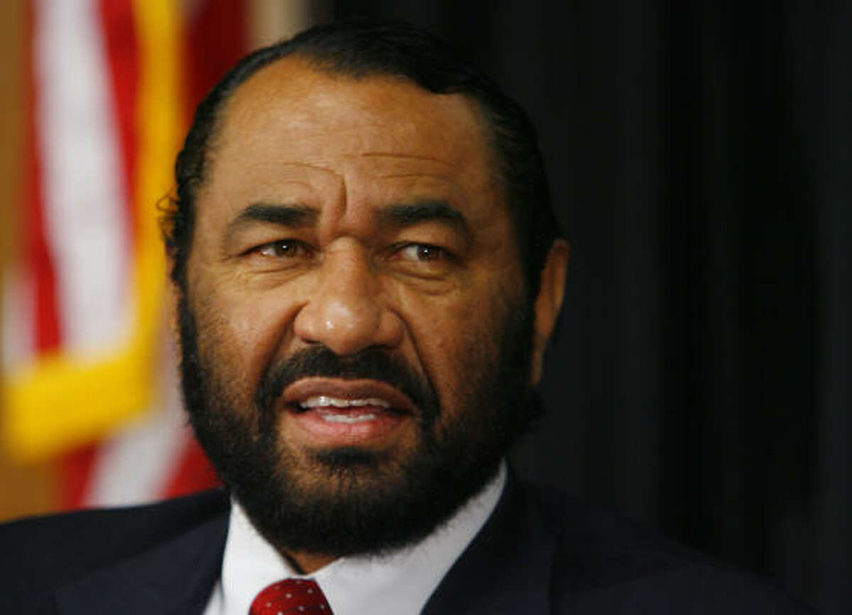 U.S. Rep. Al Green says that as the son of a man who couldn't read or write, he can now write laws for 300 million.