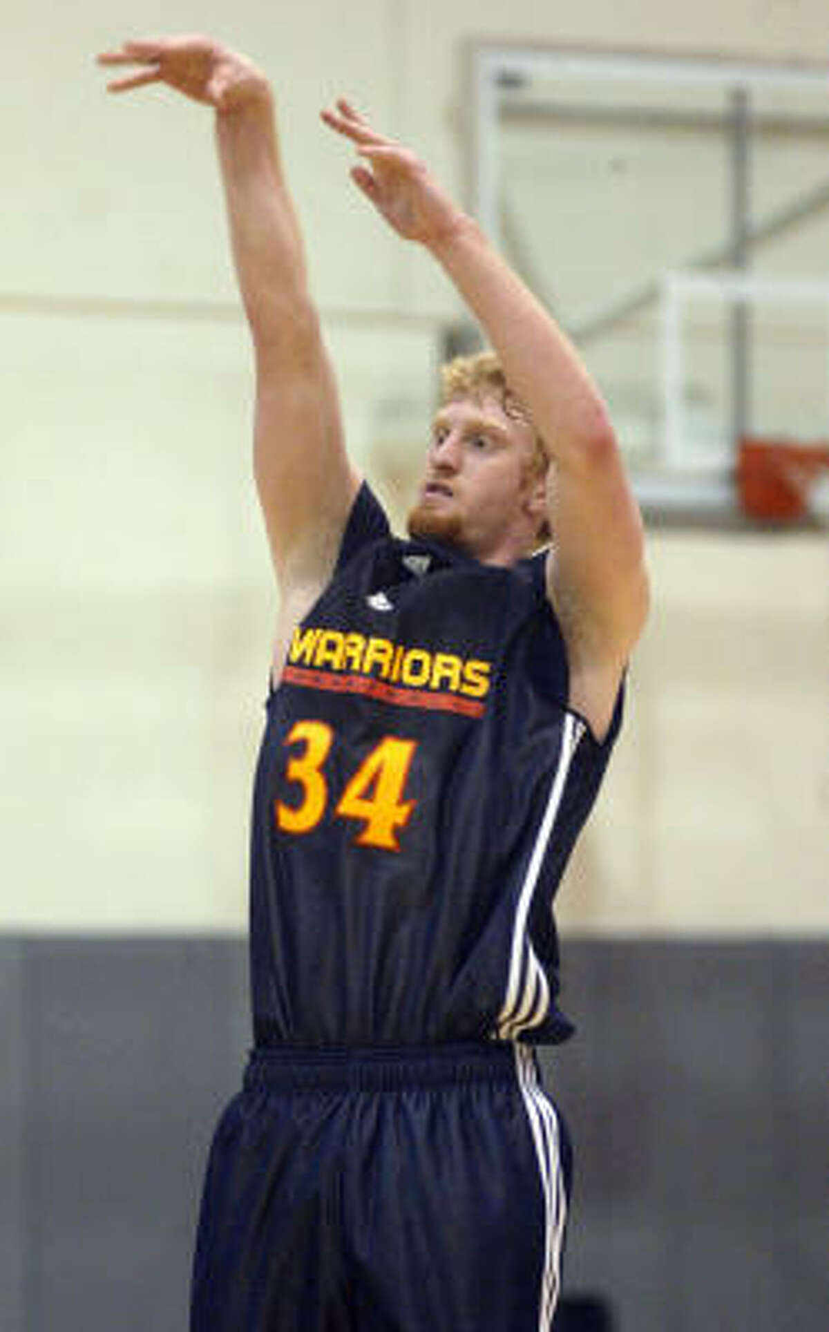 Chase Budinger, a 6-foot-7 forward from Arizona, shoots during the Golden State Warriors tryouts June 2 at their practice facility in Oakland, Calif.