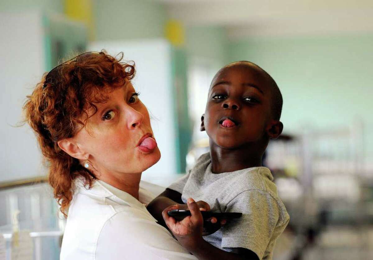 Susan Sarandon, pictured during her visit to St. Damien's children's hospital in Port-au-Prince, Haiti, was seen shopping at Kate Spade on Greenwich Avenue Wednesday afternoon. Sarandon is starring in "The Wedding," which is currently filming in Greenwich. (Photo by Kevork Djansezian/Getty Images for Artists For Peace And Justice)